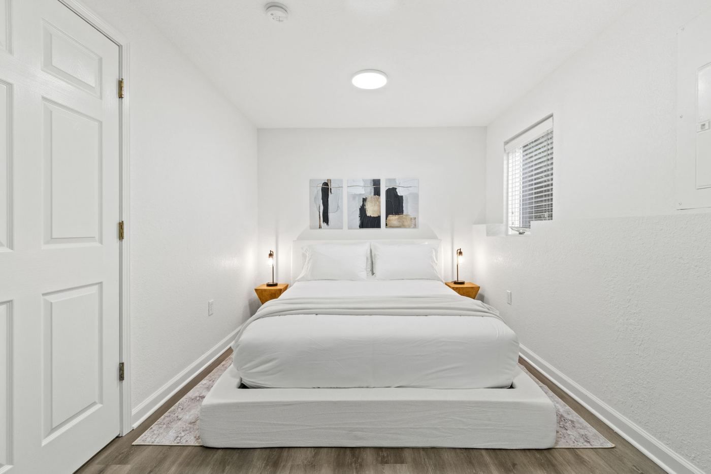 Basement bedroom with queen bed