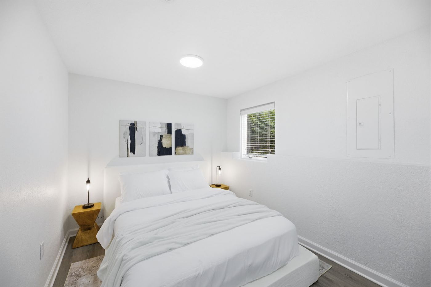Basement bedroom bed and nightstands